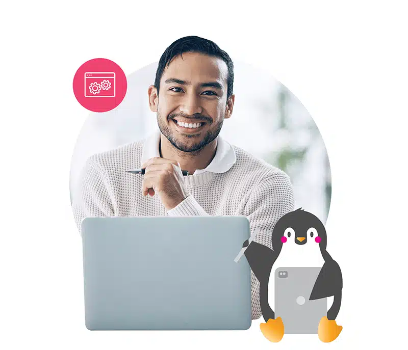 a man smiles behind a computer with an illustrated tucker nearby