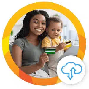 a woman and her child smile while holding credit cards