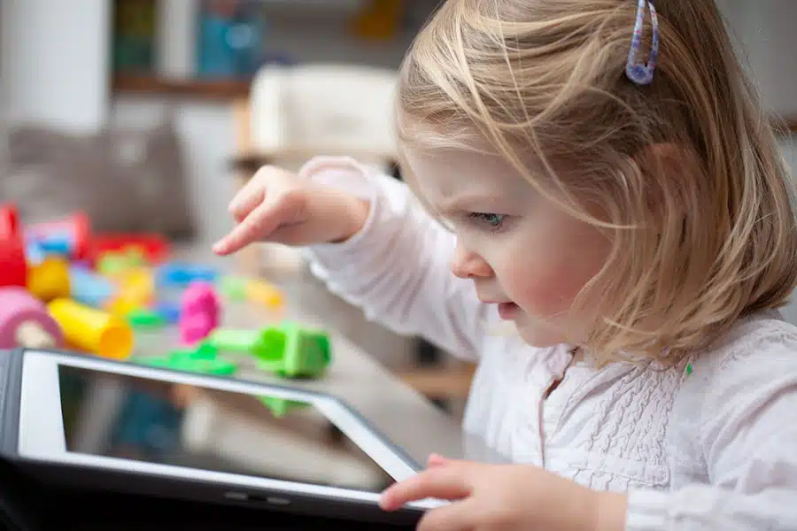 a daycare student using an early childhood education app