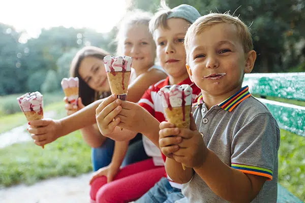 preschoolers enjoying ice cream at an ice cream social fundraiser