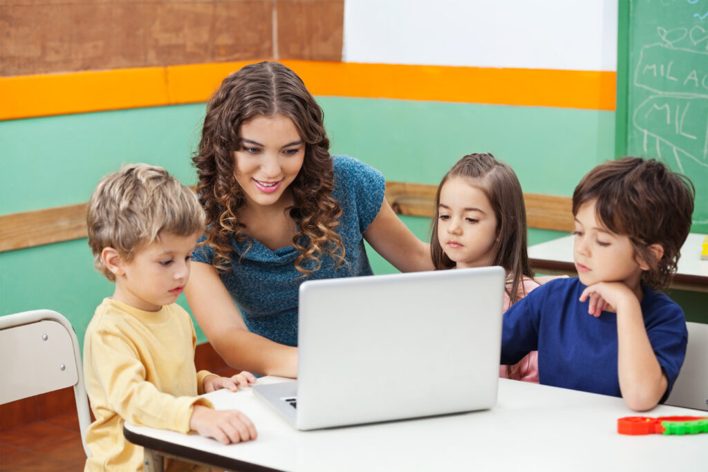 Teacher incorporates technology into a preschool classroom.
